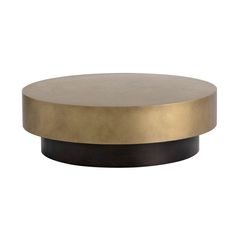 a round brass and black coffee table