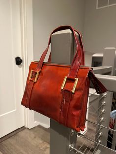 "Vintage 1960s Reddish Patent Leather Handbag Pocketbook Purse MCM | Side double handle | unmarked but has tag made in Italy  Measures 10\" long 8\" tall 3\" wide handles 13\" tall 3 compartments with one have a zipper  Top zimmer works well A few spots where leather is worn...nice vintage patina" Patent Leather Handbags, Pocket Book, Zipper Top, Vintage 1960s, Leather Handbag, Purses And Handbags, Leather Handbags, Patent Leather, Patina