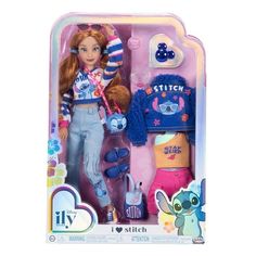 a doll in a box with clothes and accessories