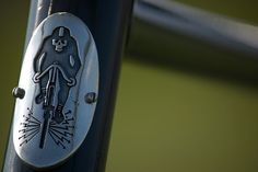 a close up of a bike handle with a sticker on it's side