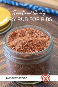 the best recipe for homemade dry rubs in a glass jar on top of a wooden table