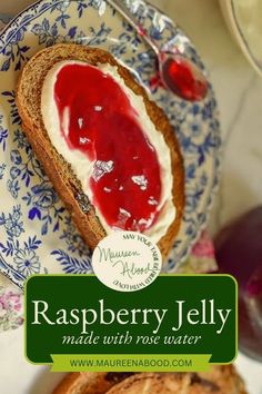 raspberry jelly made with rose water is on a plate next to toasted bread