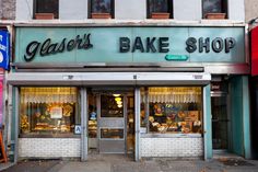 a baker's bake shop on the corner of a street