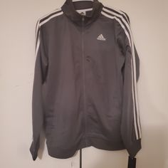 Grey Adidas Jacket Xl 18/20 Outdoor Sportswear Casual Adidas Long Sleeve Track Jacket With Ribbed Cuffs, Adidas Cotton Track Jacket For Fall, Adidas Long Sleeve Winter Track Jacket, Adidas Winter Track Jacket Long Sleeve, Adidas Winter Track Jacket With Ribbed Cuffs, Adidas Long Sleeve Outerwear With Ribbed Cuffs, Adidas Cotton Outerwear With Ribbed Cuffs, Gray Long Sleeve Sportswear Outerwear, Adidas Grey