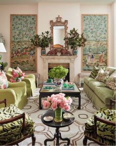 a living room filled with furniture and flowers