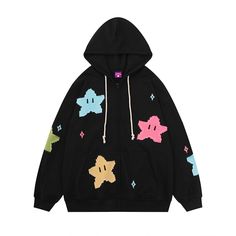 a black hoodie with colorful stars on it