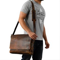 This brown satchel messenger bag, made from genuine leather, combines vintage charm with modern functionality. With ample space and an adjustable strap, it's a stylish and durable companion for any adventure. Brown Saddle Bag With Adjustable Strap For Everyday, Distressed Brown Leather-lined Satchel Shoulder Bag, Vintage Laptop Bag With Adjustable Strap For Everyday, Vintage Brown Bag With Detachable Strap For Everyday Use, Vintage Brown Satchel Saddle Bag For Travel, Brown Shoulder Bag Satchel With Waxed Finish, Distressed Brown Crossbody Shoulder Bag For Travel, Vintage Brown Saddle Bag Satchel For Travel, Everyday Carry Satchel Shoulder Bag With Leather Strap