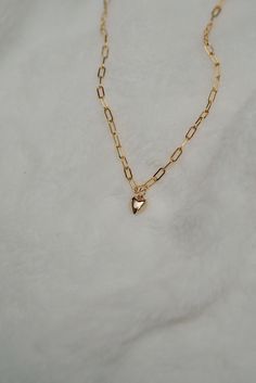 14k gold fill material. Hangs at 16” or 18” - no extender. Water and tarnish resistant. 14k Rose Gold Necklace With Heart Charm, Rose Gold Plated Charm Necklaces With Heart Charm, Rose Gold Plated Heart Charm Necklaces, Rose Gold Plated Charm Necklace With Heart Charm, Rose Gold Heart Charm Necklace, Gold Plated, Dainty Everyday Chain Necklace With Heart Charm, 14k Gold Jewelry With Heart Charm For Everyday, Gold-tone Heart Pendant Necklace With Tarnish Resistance, Gold-tone Heart Pendant Necklace Tarnish Resistant