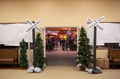 the entrance to a building decorated for christmas