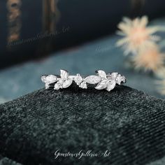 an image of a ring with flowers on it