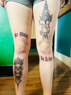 two women with tattoos on their legs standing next to each other