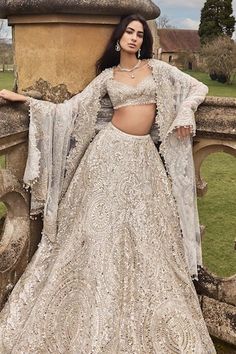 Cream attached cancan lehenga with gold thread, mirror embroidery in geometric pattern. Paired with sweetheart neck embroidered padded blouse and tassel border embroidered dupatta. - Aza Fashions Cocktail Sangeet Outfit Women, Gold Lehenga Bridal, Mirror Lehenga, Indian Wedding Reception Outfits, Indian Fits, Saffron Spice, Seema Gujral, Reception Outfits, Engagement Lehenga