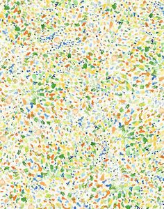 colorful sprinkles on white paper with green, orange and blue dots in the center