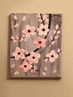 a painting with pink flowers painted on it