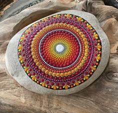 a rock with a colorful design on it