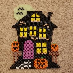 a halloween house made out of perler beads