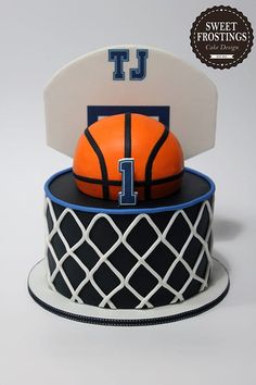 a cake with a basketball and hoop on top