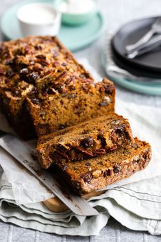 Warm, nutty brown butter notes intermingle with banana and vanilla in the base of this moist and tender loaf. It's studded with crunchy pecans, dark and milk chocolate chips and a slight sprinkle of briny sea salt flakes and hits on all of the comforting flavor notes. One slice is never enough. Banana Pecan Bread, Pecan Chocolate, Chocolate Chip Banana, Crunchy Pecans, Chocolate Chip Banana Bread, Banana Chocolate Chip, Butter Pecan, Toasted Pecans, Milk Chocolate Chips