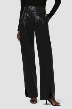 Description Re-up with our High-Rise Rosie Trouser, cut with an elevated waistline, front pleats, center seam and hem slits. The wide leg pant has a ’70s-feel, roomy leg crafted from luxe Illusion vegan leather in Black. Product Details Front Rise: 11.75", Leg Opening: 20, Inseam: 31"Model Height 5'9"Model wearing size 25Measurements based on size 27 Fit & Care Content: 100% PU Face, 100% Polyester BackMachine wash cold with like colorsDo not bleachTumble dry low or hang to dry Chic High-waisted Wide Leg Pants With Side Slits, High-waisted Workwear Bottoms With Side Slits, High-waisted Pants With Side Slits For Workwear, Casual High-waisted Bottoms With Side Slits For Work, Casual High-waisted Pants With Side Slits For Workwear, Formal Full-length Bottoms With Side Slits, Wide Leg Bottoms With Side Slits For Evening, Wide Leg Workwear Pants With Side Slits, Wide-leg Workwear Pants With Side Slits