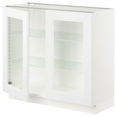 a white cabinet with two glass doors and shelves on both sides, one door open