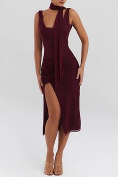 This high split, sleeveless midi dress features a beautiful floral design and a two-layer mesh material for a unique and elegant look. The backless design adds a touch of sexiness, making it perfect for parties and clubbing. Its bodycon fit accentuates curves for a flattering fit. Bodycon Spaghetti Strap Dress For Gala, Flirty Sleeveless Mesh Dress For Party, Flirty Sleeveless Mesh Party Dress, Stretch Midi-length Prom Dresses, Stretch Mesh Dress With Spaghetti Straps For Party, Sleeveless Bodycon Dress For Gala Party Season, Elegant Summer Bodycon Dress For Gala, Elegant Sheer Strapless Mesh Dress, Chiffon Mini Dress With Spaghetti Straps For Evening