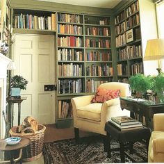 a living room filled with lots of books