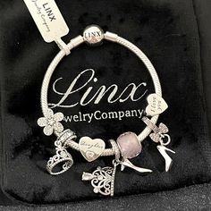 Linx Snake Chain Style Charm Bracelet In 925 Sterling Silver, With A Ball Clasp. The Bracelet Is 3mm In Width And Available In Multiple Lengths. This Bracelet Comes With 7 Linx 925 Sterling Silver Charms. All Items Are New And Come In A Luxury Velvet Jewelry Pouch. *Bracelet And Charms Are Superior Quality! Elegant Silver Wedding Charms, Elegant Silver Bangle Charm Bracelet, Elegant Sterling Silver Charms In White Gold, Elegant White Gold Sterling Silver Charms, Metal Charm Bracelet As A Gift For Her, Silver Elegant Charms For Gifts, Elegant Silver Charms For Gift, Silver Fine Jewelry Bracelet As Gift For Her, Personalized Sterling Silver Elegant Charms