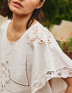 Soft and dimensional in a dreamy caftan fit, the Piper top features an ultra relaxed shape with gorgeous openwork lace throughout for a semi-sheer finish. Cut from a true white, airy cotton, Piper is a perfect topper for distressed denim, cut-offs or a printed skirt. 100% cotton Unlined Sheer openwork lace Very relaxed fit SMALLbust - open / waist - 44" / length - 21” / sleeve - 7.5" MEDIUMbust - open / waist - 46" / length - 22" / sleeve - 7.5" LARGEbust - open / waist - 48" / length - 23" / sl White Lace Tops For Summer, White Crochet Lace Top For Brunch, White Lace Patchwork Top For Summer, White Lace Patchwork Top For Brunch, White Feminine Crochet Top For Brunch, White Cotton Lace Summer Tops, White Lace Trim Top For Brunch, Feminine White Cotton Lace Top, White Cotton Lace Top With Crochet Trim