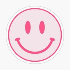 a pink smiley face sticker