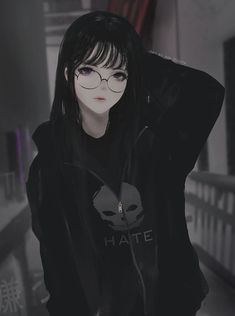 a girl with black hair and bangs wearing a hoodie in a dark colored room