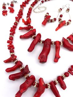 "Red Coral and 2 tone African trade beads present a tropical look perfect for a luau, cruise or tropical beach themed gathering.   Style A - 22\" length plus a 3.5\" silver extender chain.  The center 6\" has graduated lengths of stick coral.  Tiny silver spacer beads are barely noticable around the neck portion. Style B - 20\" length plus a 3\" silver extender chain.  The center 5\" has graduated lengths of stick coral.  Tiny silver spacer  beads are barely noticable around the neck portion. Ea Red Coral Earrings, African Trade Beads, Coral Earrings, Trade Beads, Beach Themed, Precious Jewelry, Tropical Beach, Beads Necklace, Red Coral