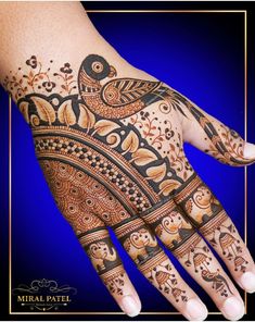 the hand is decorated with intricate designs