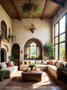 a living room filled with lots of furniture and plants on top of it's walls