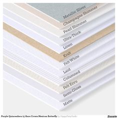 a stack of white and beige sheets with different names on the bottom one is labeled