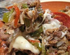 a close up of food on a plate with a fork