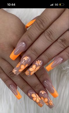 Pretty Nails Orange, Late Summer Nail Designs, Orange Summer Nails Designs, Orange Nails Flowers, Flowers In Nails, Neon Orange Nail Designs, Coral Color Nails, Orange Nails With Flowers, Orange And Yellow Nail Designs