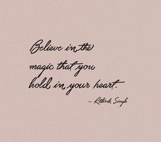 a black and white photo with the words believe in the magic that you hold in your heart