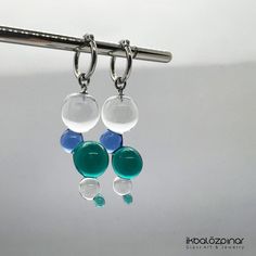 Murano glass handmade earrings. They are unique and they were produced in limited edition only by me. Each piece is handmade in the lampworking techique, which gives it a unique character, therefore each piece can be a little bit different. The hoops are high quality stainless steel. They will never tarnish, it is resistant to bumps and scratches. Diameter of the hoops are 1.5 cm. Including the hoop, the earrings are about 5.5 cm long. Glass Drop Earrings As Gift, Modern Clear Dangle Earrings, Modern Glass Teardrop Earrings, Minimalist Glass Dangle Earrings, Modern Glass Earrings For Gifts, Modern Clear Earrings As Gift, Modern Clear Earrings As A Gift, Modern Clear Earrings For Gifts, Modern Round Glass Earrings