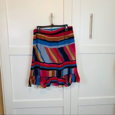 Multicolor Ruffled Skirt Multicolor Ruffle Hem Skirt For Spring, Multicolor Tiered Skirt With Ruffle Hem, Multicolor Ruffle Hem Skirt For Summer, Multicolor Skirt With Ruffle Hem For Summer, Multicolor Asymmetrical Lined Skirt, Multicolor Ruffled Midi Skirt, Multicolor Ruffled Mini Skirt, Multicolor Mini Skirt With Ruffles, Chic Multicolor Asymmetrical Skirt