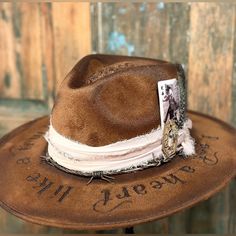 “Dreams And Gasoline” Hand Burned Design Signed And Numbered One Size Fits Most. Soft Comfortable Elasticized Inner Band. Free Personalization Cowgirl Hat With Feather, Personalized Cowgirl Hat, Burned Fedora Hat, Custom Hat Bands, Boho Hats For Women, Derby Hat Diy, Custom Cowgirl Hats, Hat Branding, Burnt Hats