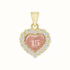 Gold Quince Años 15th Birthday Heart Pendant Necklace in Solid Gold This heart pendant is studded with cubic zirconias and has a 15 in the middle. It makes for the perfect quinceanera present.Product Information Metal: 14K Yellow/White/Rose Gold Stone: Cubic zirconia Weight: 1.07 g Dimensions: 11 mm. x 11 mm. SKU: QM1785 Made in Los Angeles, CA Gold Heart-cut Necklace For Birthday, Personalized Elegant Jewelry For Sweet 16, Silver Jewelry For Sweet 16 And Valentine's Day, Sweet 15 Necklace, 15 Necklace Quinceanera Gold, Yellow Gold Heart-shaped Necklace For Birthday, Quince Necklace With Name, Personalized Heart-shaped Jewelry For Sweet 16, Gold Quince