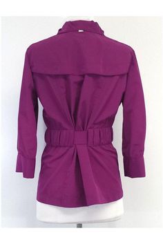 Size 6 Magenta 3/4 Sleeves Trench Jacket 100% polyester Collared Silver-tone hardware Zip up front Flap over chest & hip pockets Cinched waist tie design Slightly pleated sleeves Layered back design Bust 37" Waist 36" Shoulder to shoulder 15.5" Sleeve length 18.25" Shoulder to hem 25.25" Spring Outerwear With Tie Waist In Solid Color, Solid Tie Waist Outerwear For Spring, Spring Outerwear With Tie Waist, Spring Blazer With Tie Waist And Long Sleeves, Spring Workwear Outerwear With Roll-up Sleeves, Fall Long Sleeve Blazer With Tie Waist, Fall Blazer With Tie Waist And Long Sleeves, Fall Outerwear With Pockets And 3/4 Sleeve, Spring Outerwear With Tie Waist And Long Sleeves