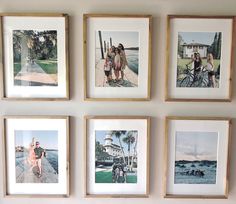 six framed photographs hanging on the wall