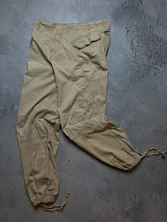 Nike Track Cargo Pants Baggy Vintage Gorpcore Drill Joggers Size Men's / US 32 / EU 48 / M Color Brown khaki Condition Used The material is pleasant to the body. In a good condition. Fast sending! Length - 106 cm Waist - 44 cm Inseam - 78 cm Leg Opening - 22 cm Front Rise - 29 cm Thigh - 32 cm   Condition : 8/10 - ALL ITEMS ARE HEAT TREATED AND WASHED BEFORE SHIPPING - FOLLOW MY STORE - SEE MY OTHER ITEMS Relaxed Fit Khaki Combat Pants, Relaxed Fit Combat Pants In Khaki, Full Length Cotton Combat Parachute Pants, Khaki Combat Pants With Pockets, Khaki Cargo Pocket Sweatpants, Baggy Khaki Joggers For Streetwear, Khaki Full-length Utility Parachute Pants, Khaki Combat Parachute Pants With Pockets, Khaki Combat Full-length Pants