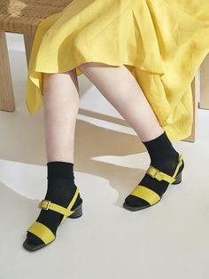 *All items are made-to-order and can not be canceled, changed or refunded after ordering- Candy mid sandals- Color scheme design- Strap to hold back- Point buckle detail- Glossy material- Mid-heeled comfort design- Yellow+Grey colorMeasurements(in.) - Heel height: 1.5 in - Size: KR220(US 5) - KR255(US 8.5)* Recommended to wear normal size Composition - Goat leather- Avoid direct contact with water- Do not dry directly in the sun or in the fire- Natural leather products should be wiped with Yellow Sandals With Low Heel And Heel Strap, Yellow Sandals With Heel Strap And Low Heel, Yellow Open Toe Sandals With Heel Strap, Yellow Slingback Sandals With Heel Strap And Round Toe, Yellow Sandals With Heel And Ankle Strap, Yellow Block Heels With Buckle Closure, Yellow Slingback Sandals With Heel Strap, Yellow Open Heel Slingback Sandals, Yellow Open Heel Slingback Sandals With Strap