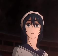 an anime character with black hair wearing a sailor's outfit and looking at the camera