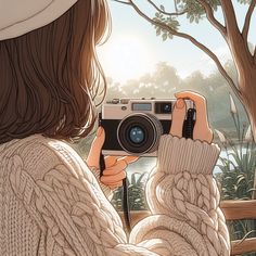 a person taking a photo with a camera in front of trees and water, while wearing a white hat