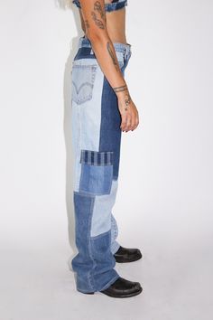 Upcycled Denim Cargo Pant Patchwork Style Side Cargo Pocketing w/ Snaps Zip Fly Recycled Denim Bottoms With Patch Pockets And Tapered Leg, Mid-rise Rigid Denim Bottoms With Contrast Stitching, High Waist Blue Bottoms With Contrast Stitching, Blue High Waist Bottoms With Contrast Stitching, Indigo Rigid Denim Pants With Pockets, Recycled Denim Full Length Bottoms With Five Pockets, Indigo Wide Leg Recycled Denim Bottoms, Blue Rigid Denim Pants With Contrast Stitching, Blue Wide Leg Bottoms With Contrast Stitching