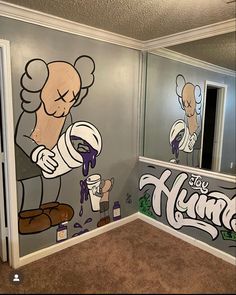 a bathroom with graffiti on the walls, and a mirror in the corner next to it