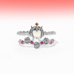 Introducing our Star Wars™ Padmé Amidala™ Adjustable Ring, the embodiment of majesty. This exquisite piece pays homage to the Queen of Naboo, featuring Padmé Amidala in her iconic headwear, pale complexion, and a captivating red accented stone. The delicate metal rose detailing is adorned with vibrant fuchsia and pink stones, reminiscent of her Meadow dress. Immerse yourself in the elegance and grace of true royalty with this remarkable ring. Star Wars Padme Amidala, Pale Complexion, Star Wars Padme, Padme Amidala, Pink Stone, Adjustable Rings, Two By Two, Silver Rings, Stars